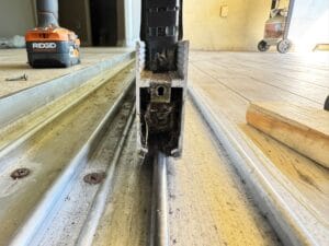 Rollers replaced during sliding door repair in Brandon